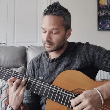 Aurora Guitar - Professional Spanish and Blues Session Guitarist for Fashion and Film